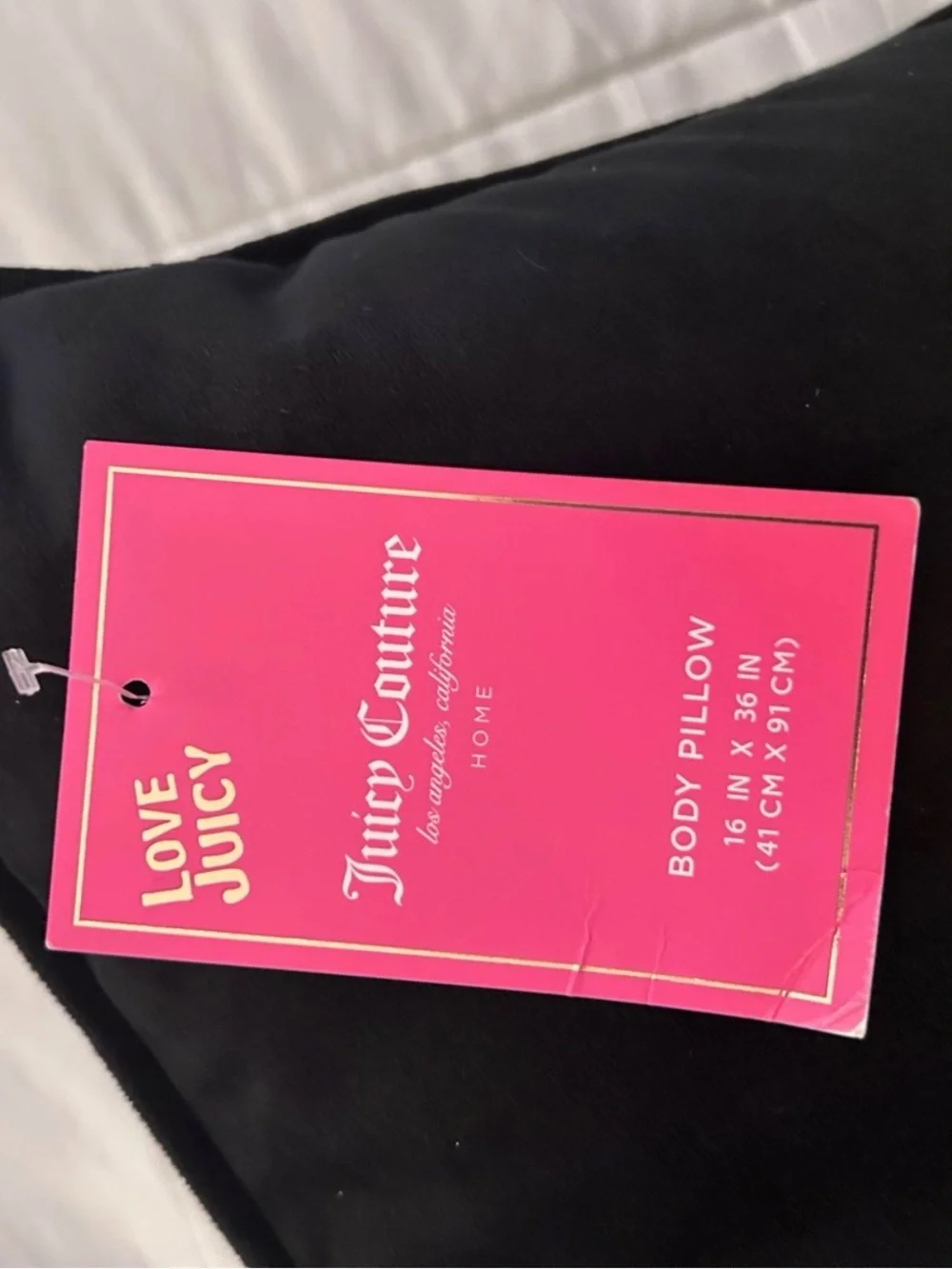Juicy Couture Black Body Pillow with Pink Tag